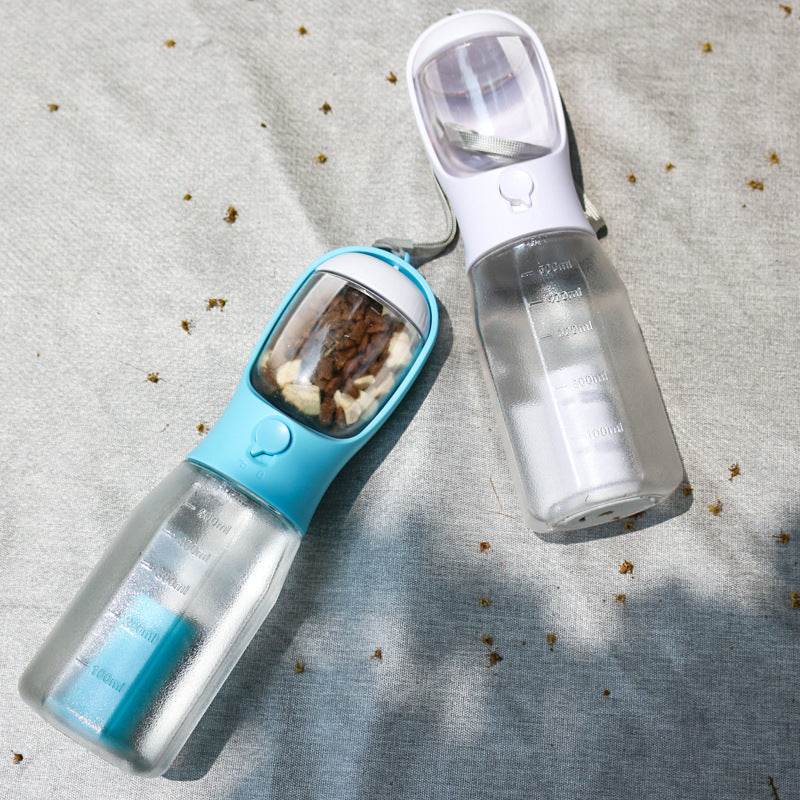 Dog travel water bottle with built-in drinking tray